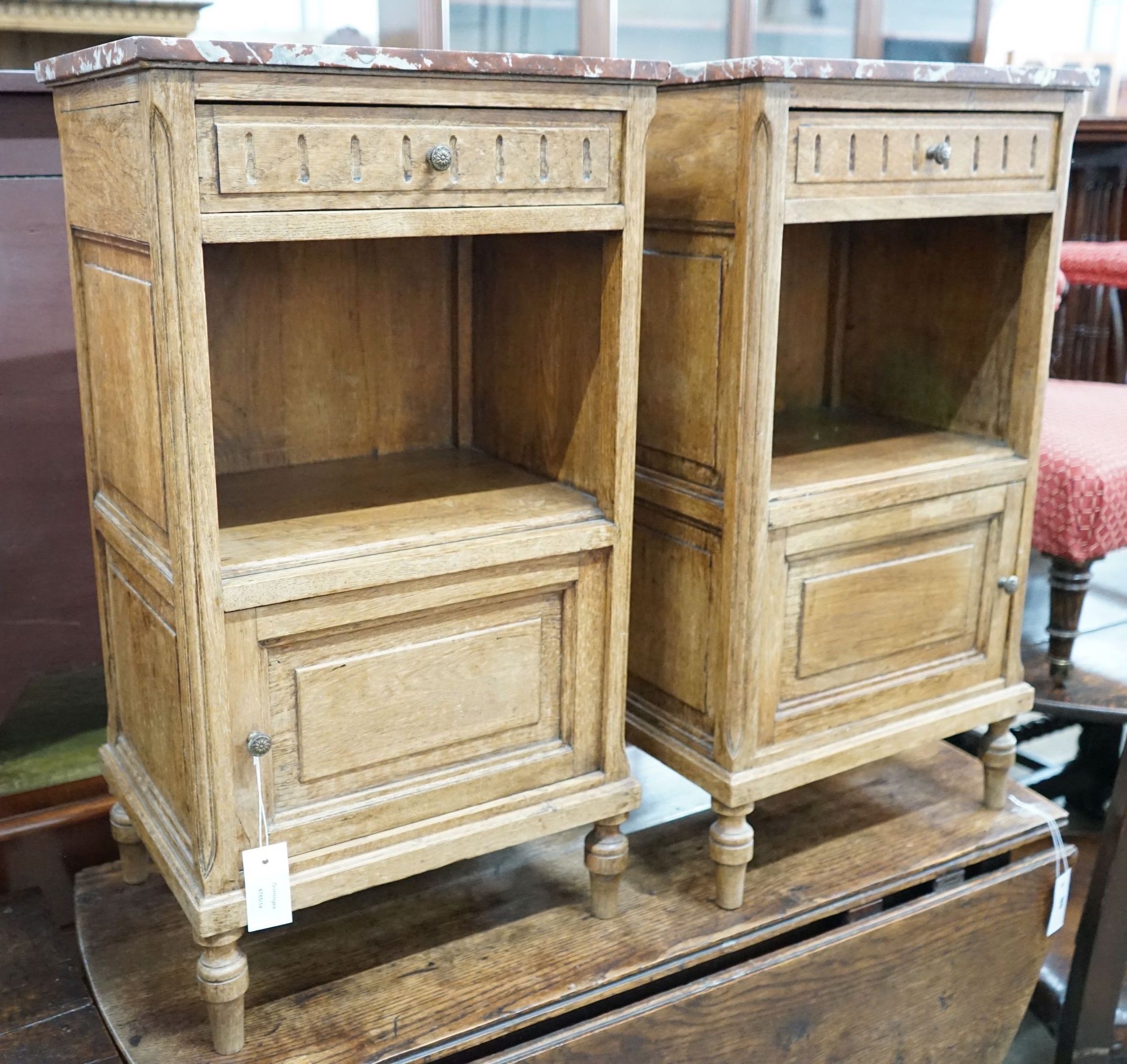 A pair of late 19th / early 20th century French oak marble topped bedside cabinets, width 43cm, depth 33cm, height 79cm